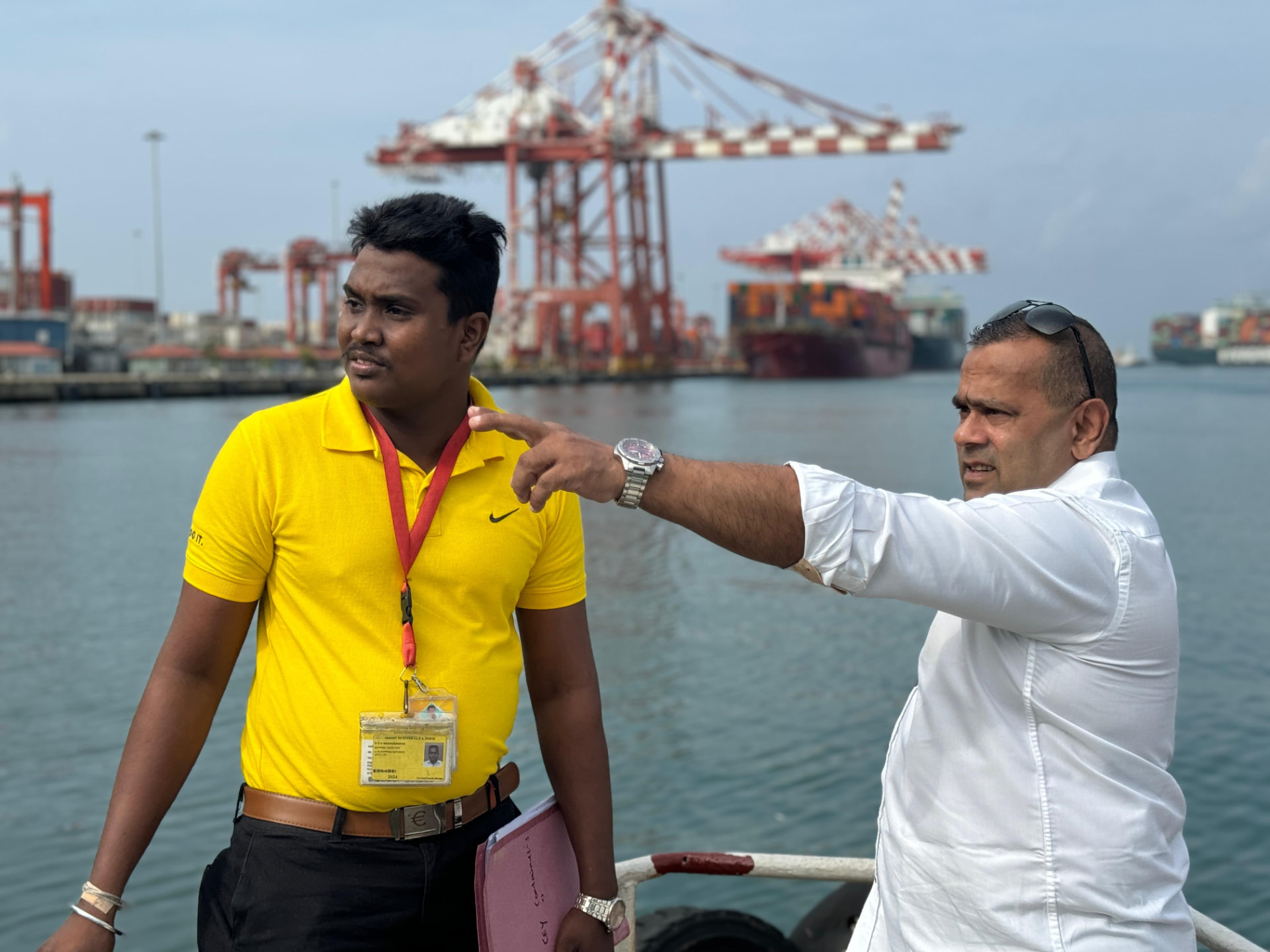 ILM Shipping team briefing alongside a berthed vessel in Colombo Port