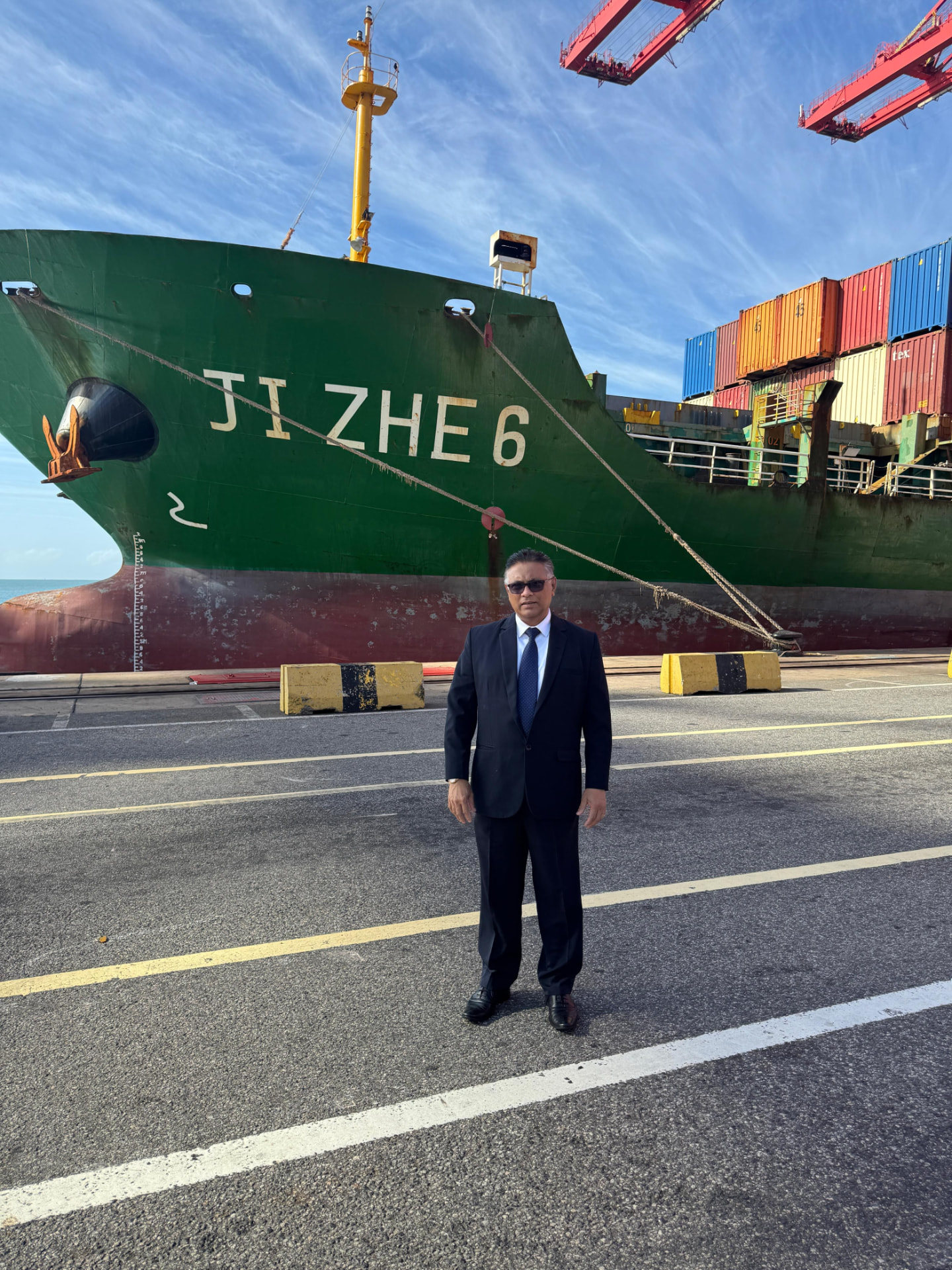 OCL representative on the terminal apron in front of a berthed vessel