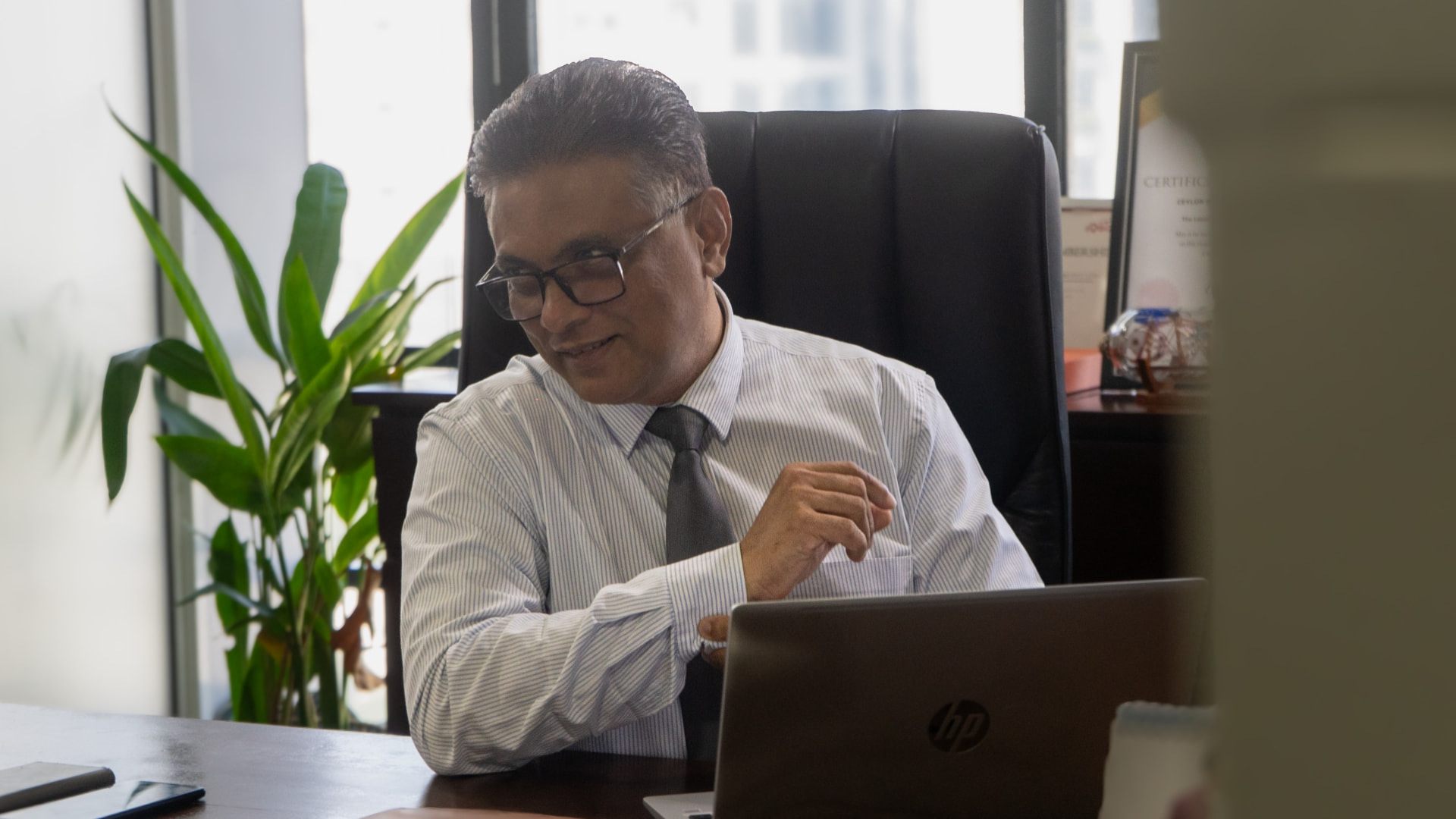 Hadley Rodrigo, Founder and Group Chairman of ILM Holdings, at his desk