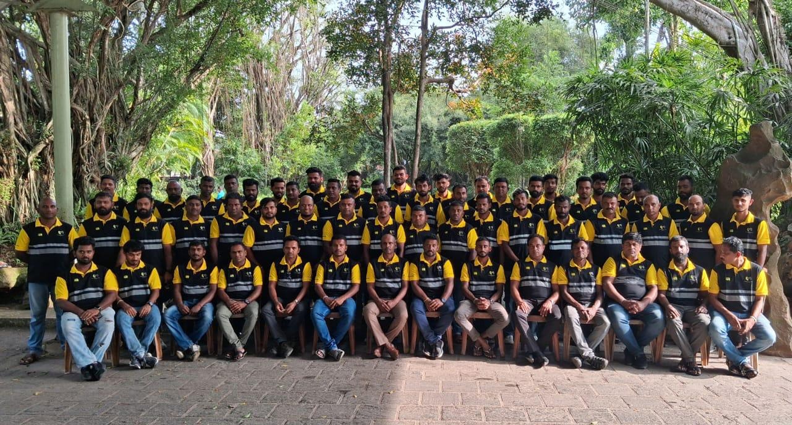 Large group photo of the International Logistics & Movers operations team in uniform