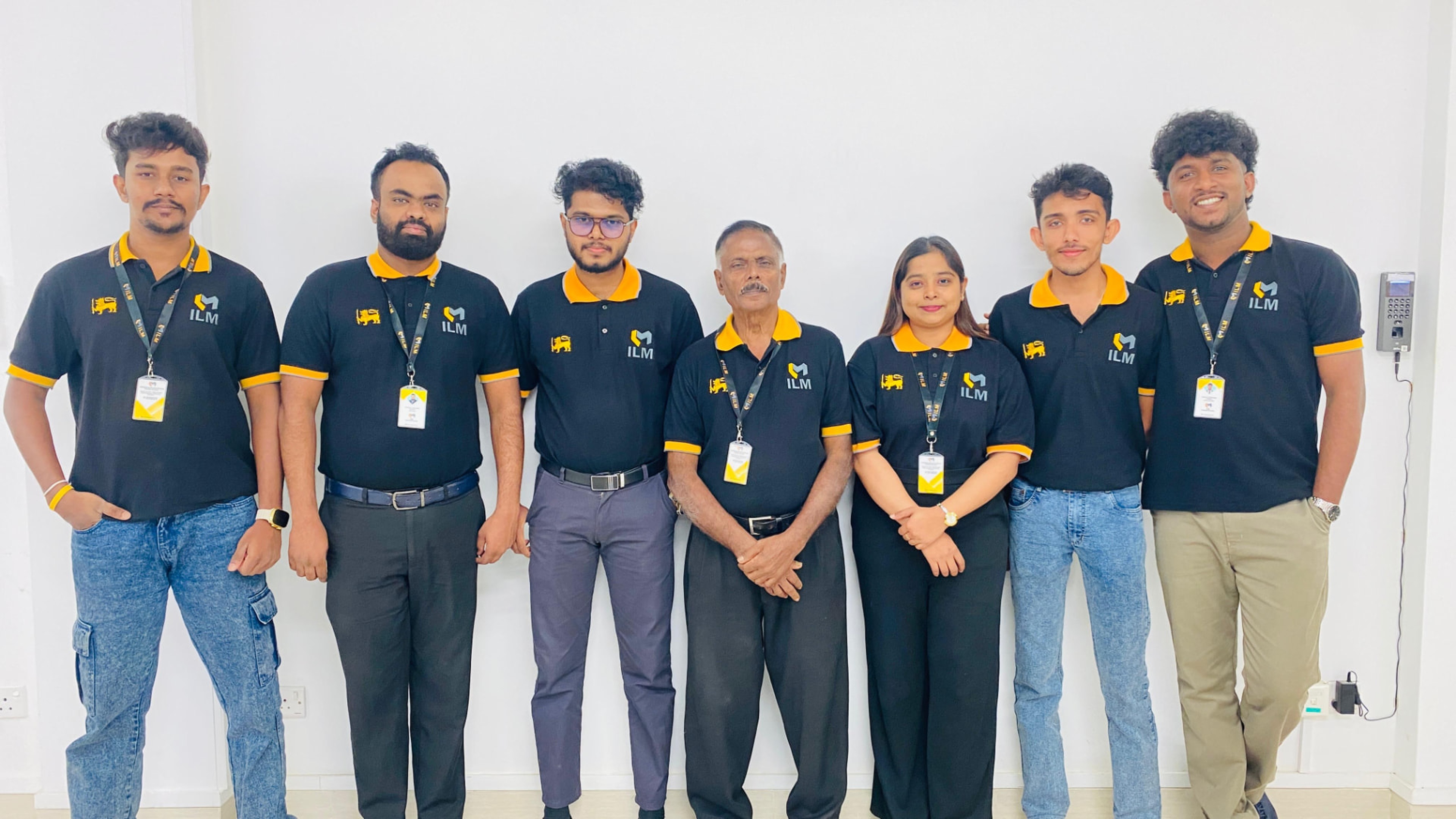 ILM Shipping Services staff in branded polo shirts at the Colombo office