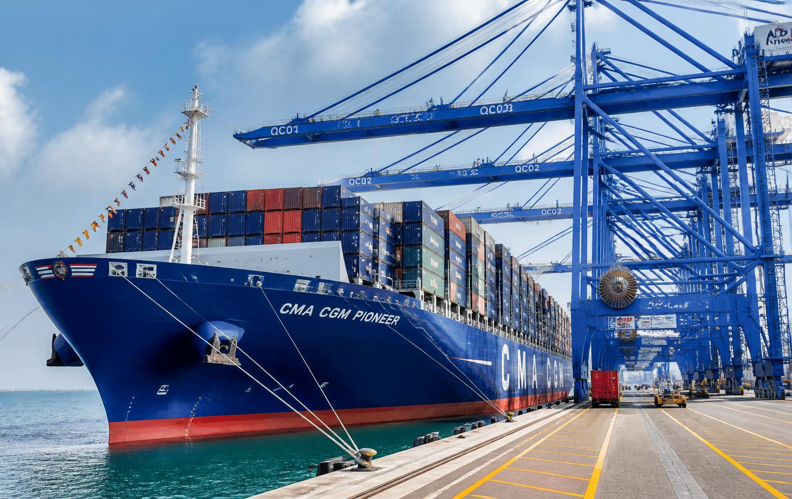 Container vessel berthed under gantry cranes at a modern container terminal